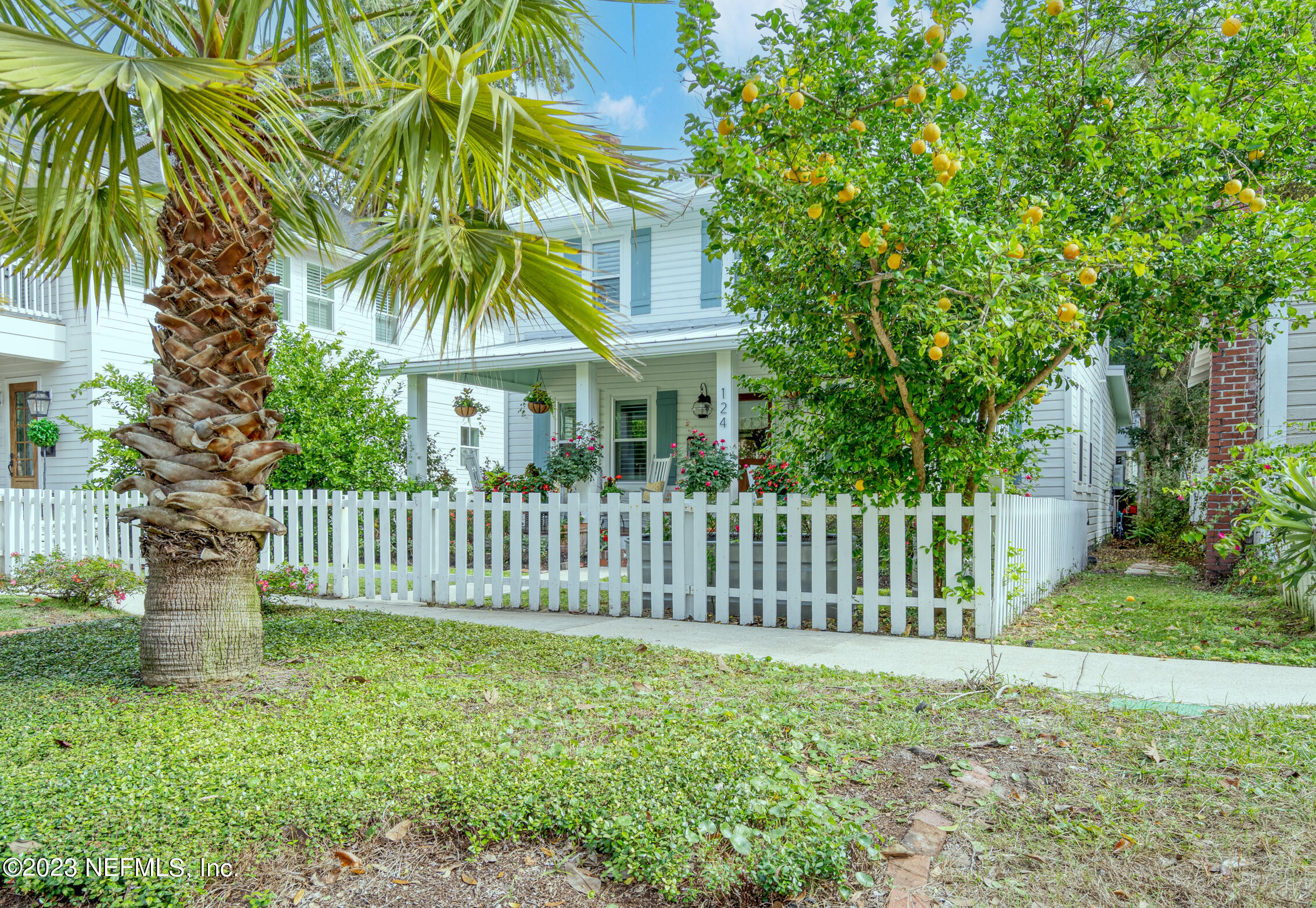 124 South 5th Street Fernandina Beach, FL 32034 - Photo 52 of 60 a house view with a garden