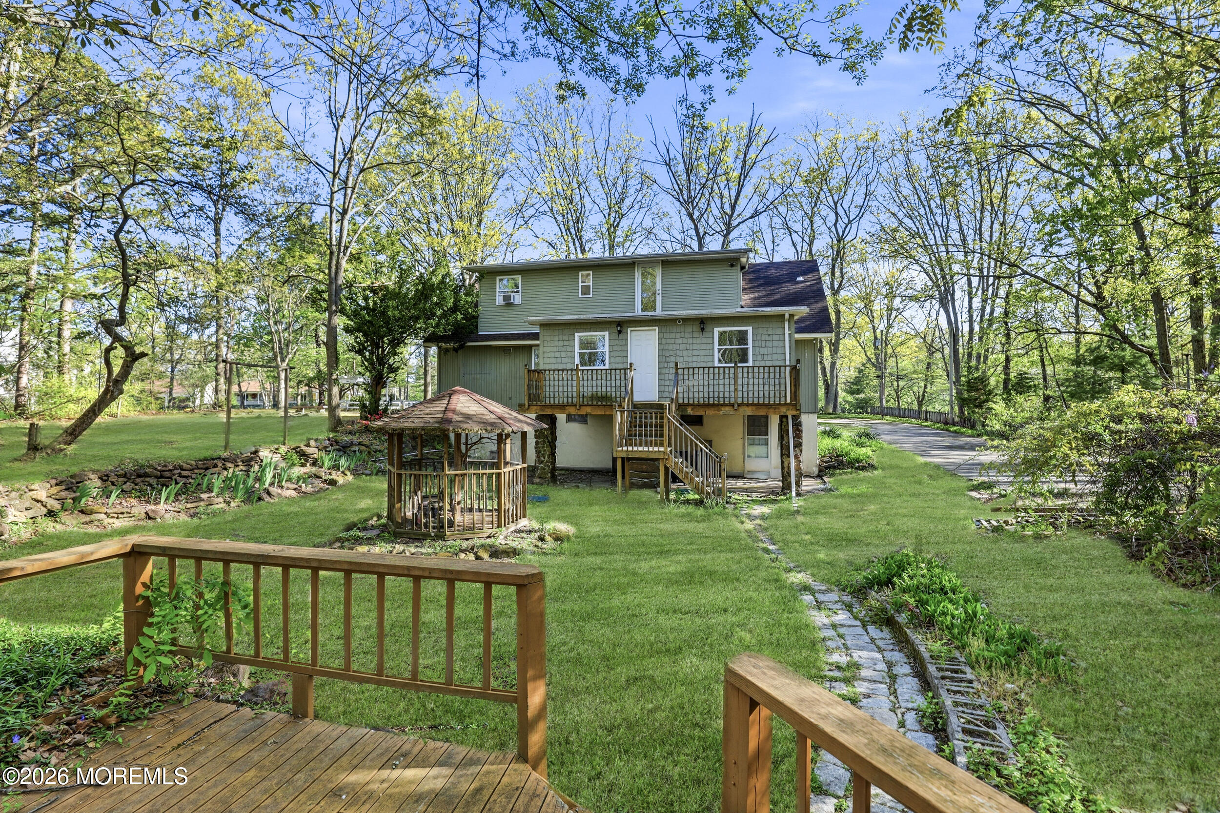 492 Cobain Road Jackson, NJ 08527 - Photo 42 of 47 a view of house with a yard and furniture