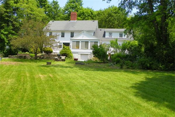 53 Argilla Road Ipswich, MA 01938 - Photo 1 of 11 a view of a house with a yard porch and sitting area