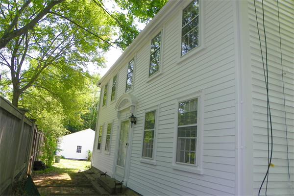 53 Argilla Road Ipswich, MA 01938 - Photo 10 of 11 a view of a house with a backyard