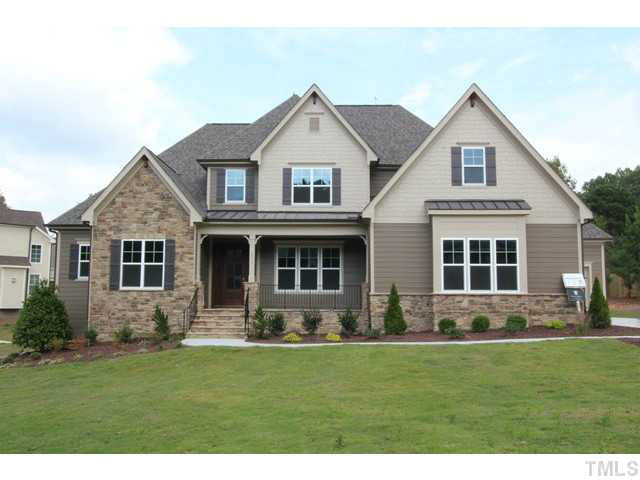 3208 Bryant Falls Court Raleigh, NC 27613 - Photo 1 of 25 a front view of house with yard and green space