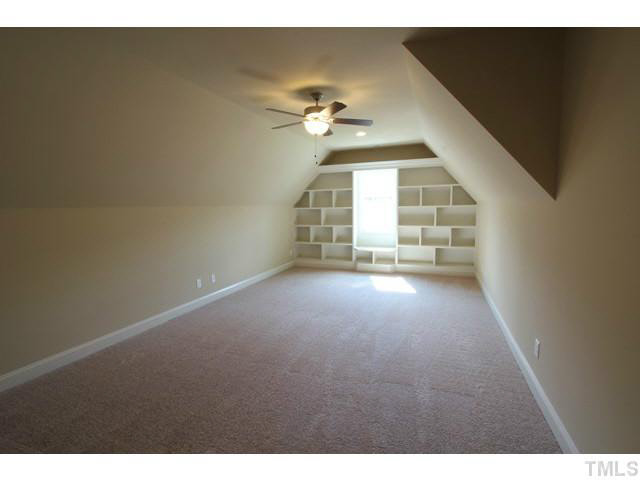 3208 Bryant Falls Court Raleigh, NC 27613 - Photo 13 of 25 a view of empty room with ceiling fan