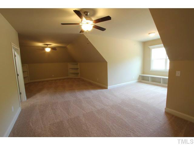 3208 Bryant Falls Court Raleigh, NC 27613 - Photo 15 of 25 a view of an empty room with a window