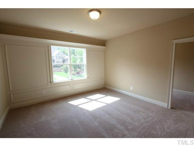 3208 Bryant Falls Court Raleigh, NC 27613 - Photo 16 of 25 a view of an empty room with a window