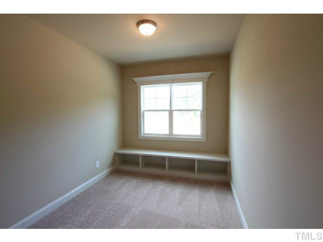3208 Bryant Falls Court Raleigh, NC 27613 - Photo 17 of 25 a room with a window