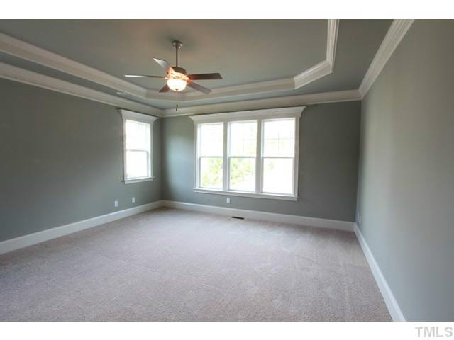 3208 Bryant Falls Court Raleigh, NC 27613 - Photo 9 of 25 a view of an empty room with ceiling fan