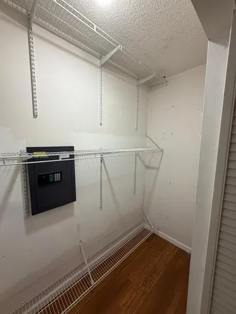 a view of storage and utility room with washer and dryer