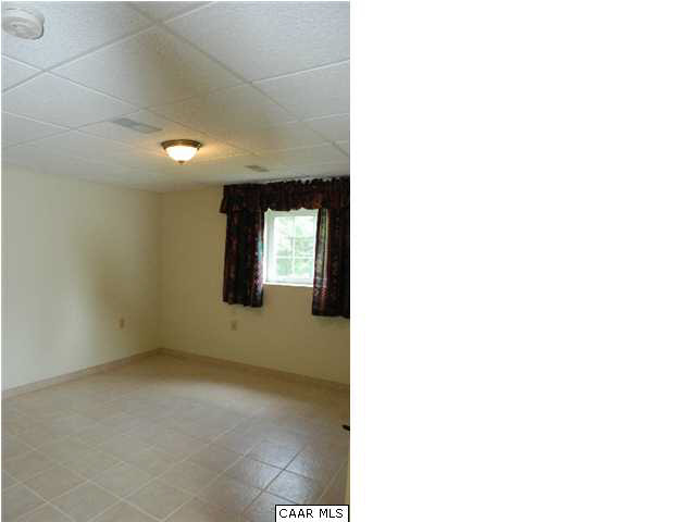 5945 South River Road Stanardsville, VA 22973 - Photo 13 of 16 Perfect for guests, bedroom and full bath in lower level.