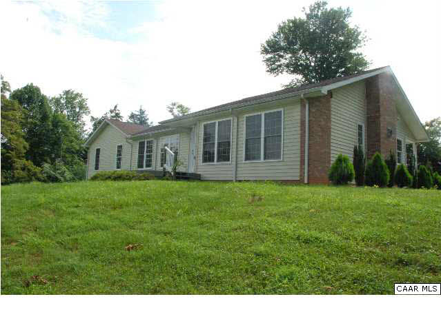 One level living in a peaceful country setting.