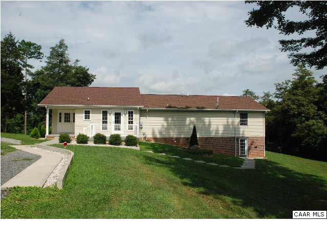 You will appreciate the large parking area, walk out basement and nice landscaping.