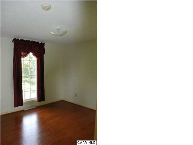 5945 South River Road Stanardsville, VA 22973 - Photo 9 of 16 Master bedroom has wood floors.