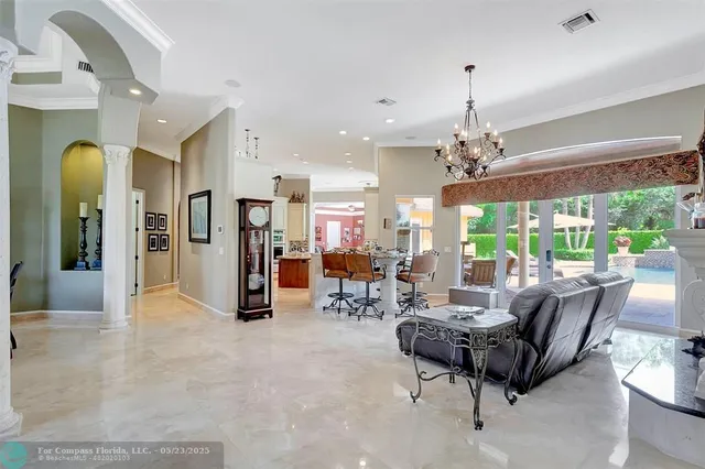 a view of a storage and utility room with washer and dryer