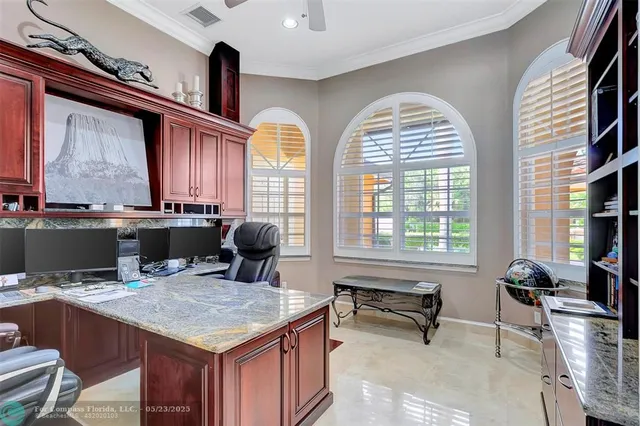 a bathroom with a sink vanity mirror and toilet
