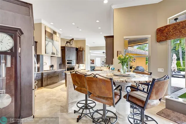 a bathroom with double vanity sinks a mirror and a shower