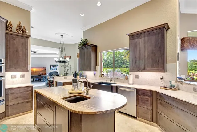 a view of kitchen and dining room with furniture