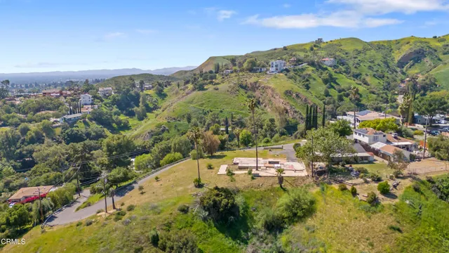 a view of a city with mountains in the background