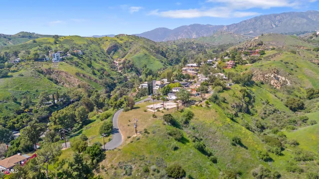a view of a city with mountains in the background