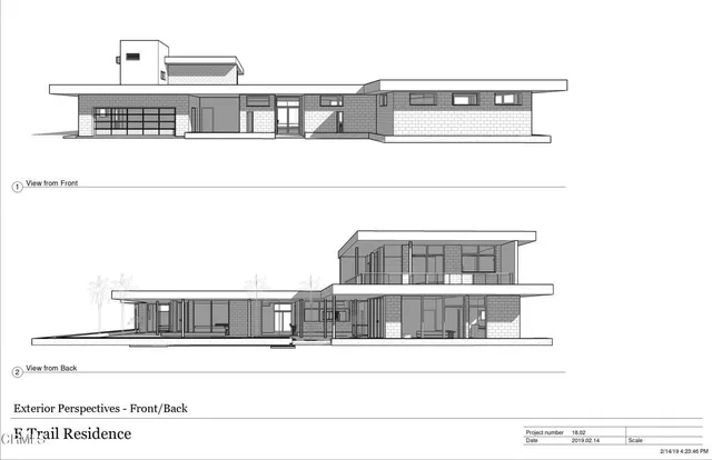 a black and white photo of a living room