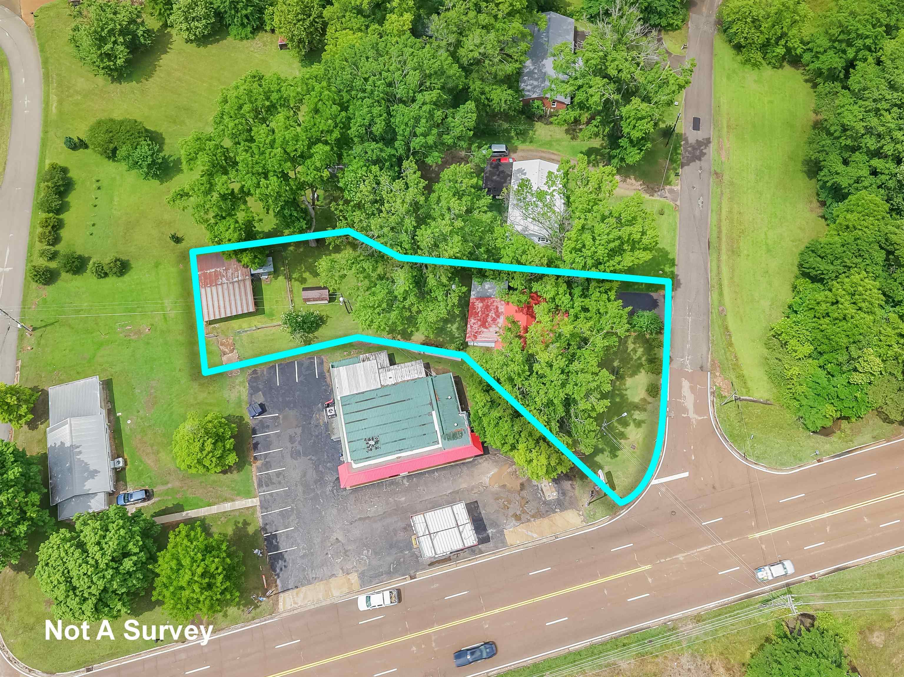 12 Baker Road Selmer, TN 38375 - Photo 7 of 28 an aerial view of a house
