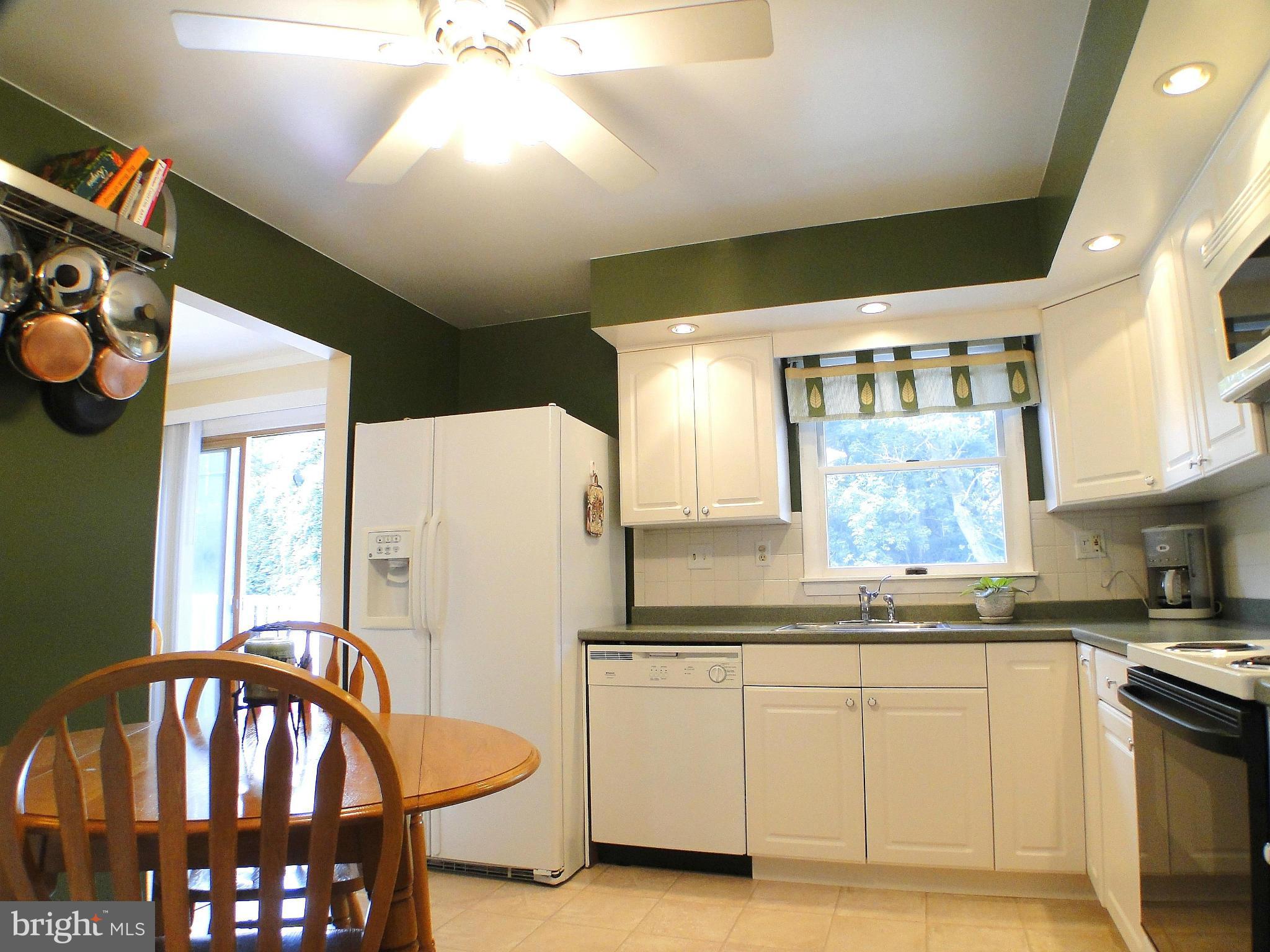 8324 Thornton Road Towson, MD 21204 - Photo 9 of 30 Laminate Flooring & Ceiling Fan