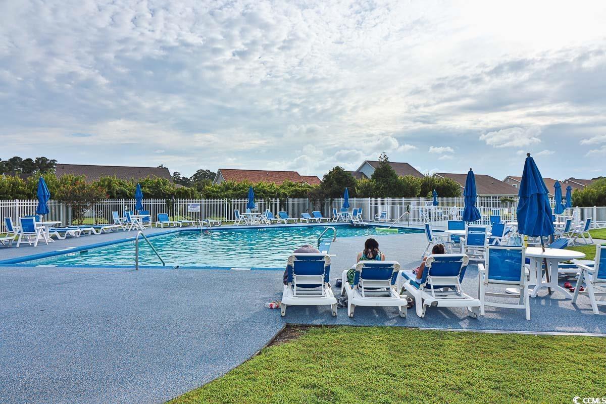 720 Gazania Lane Myrtle Beach, SC 29579 - Photo 30 of 32 Traditional-style house with concrete driveway, an attached garage, and roof with shingles