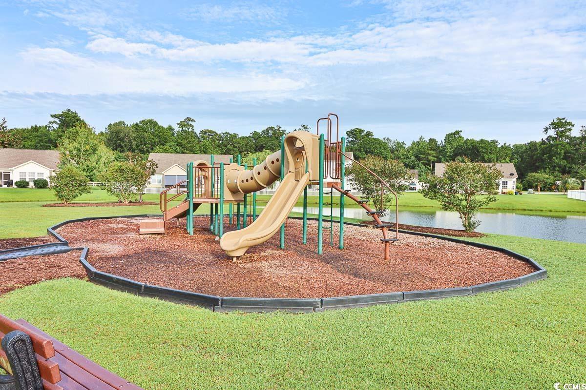 720 Gazania Lane Myrtle Beach, SC 29579 - Photo 31 of 32 Community pool featuring a patio