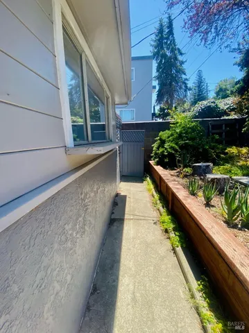 a view of balcony and yard