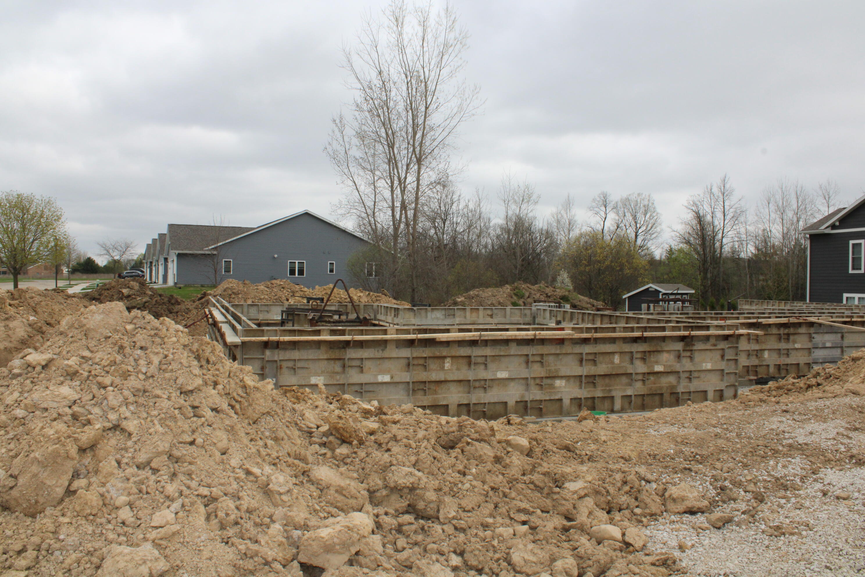 509 Emerald Point, Unit 16 Kewaskum, WI 53040 - Photo 2 of 3 basement coming