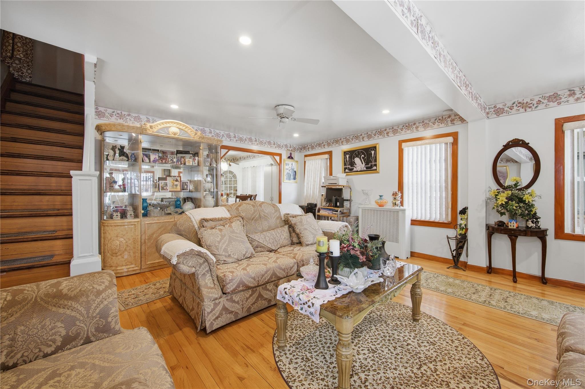 131-58 223rd Street Queens, NY 11413 - Photo 3 of 12 a living room with furniture