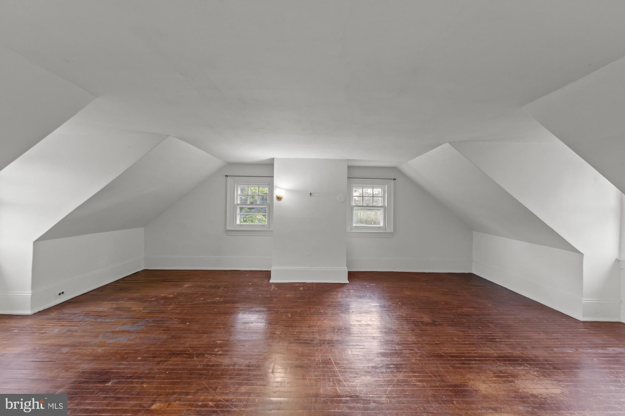 27058 Mt Pleasant Road Columbus, NJ 08022 - Photo 61 of 127 a view of an empty room with wooden floor and a window