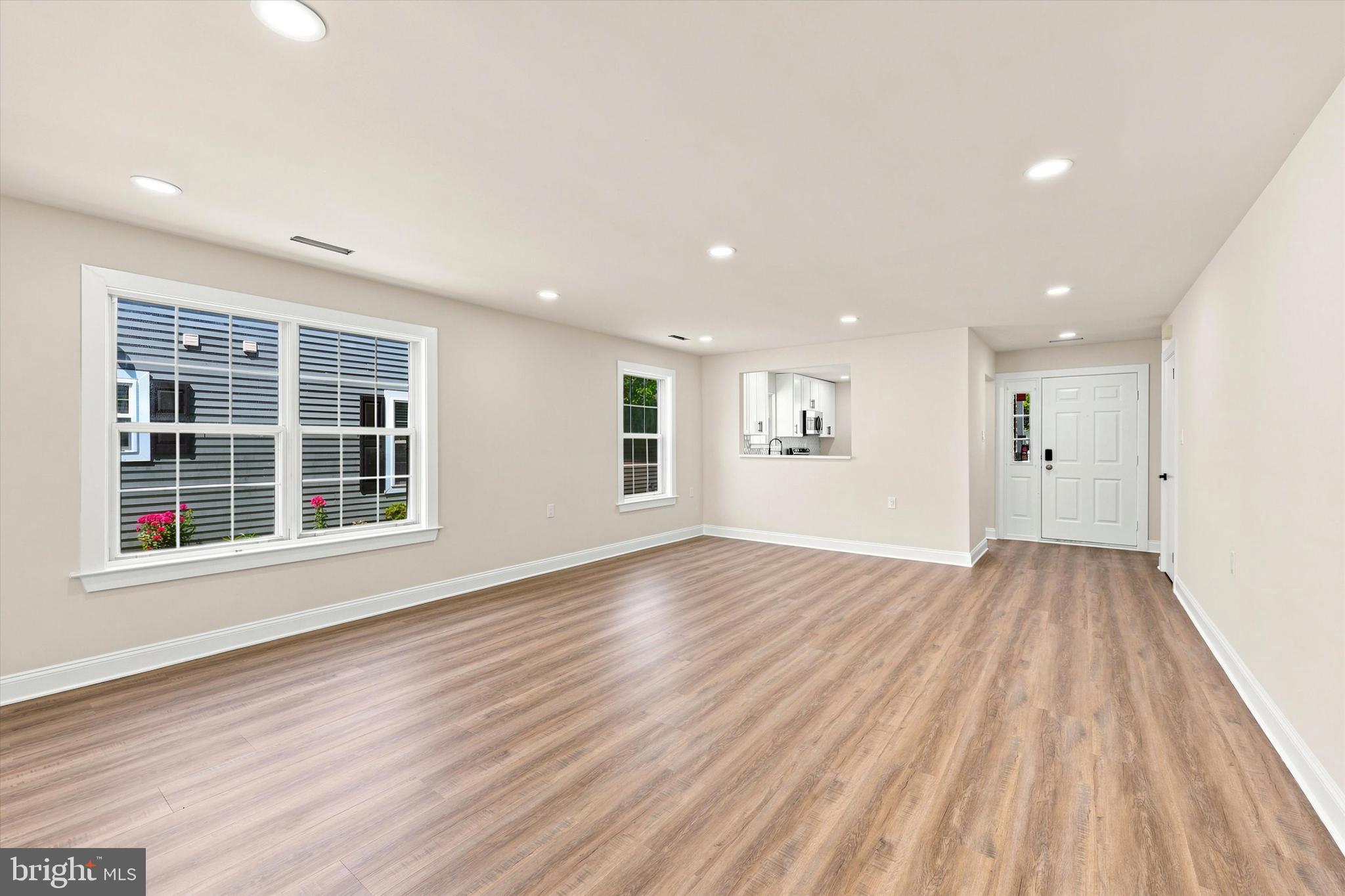2 Emory Lane Mount Laurel, NJ 08054 - Photo 20 of 25 an empty room with wooden floor and windows