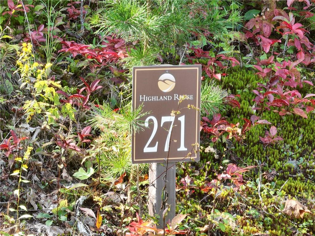 270 R Stone Cliff Drive Talking Rock, GA 30175 - Photo 34 of 34 a sign that is sitting in front of flowers