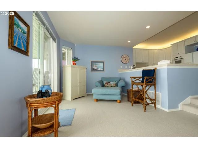 a living room with furniture a window and a piano