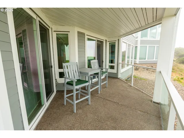 a dining room with furniture and windows