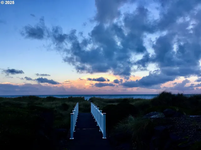 a view of an ocean and mountain