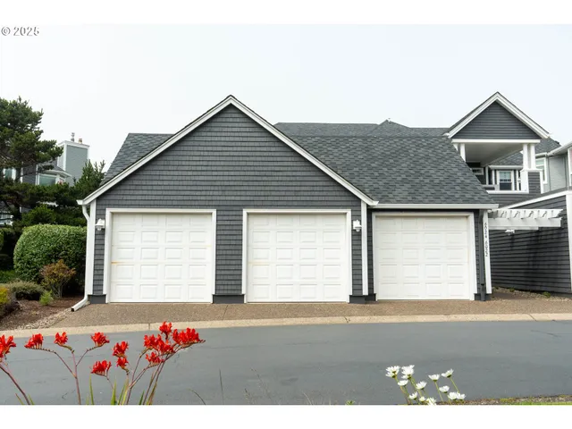 a front view of house with garage