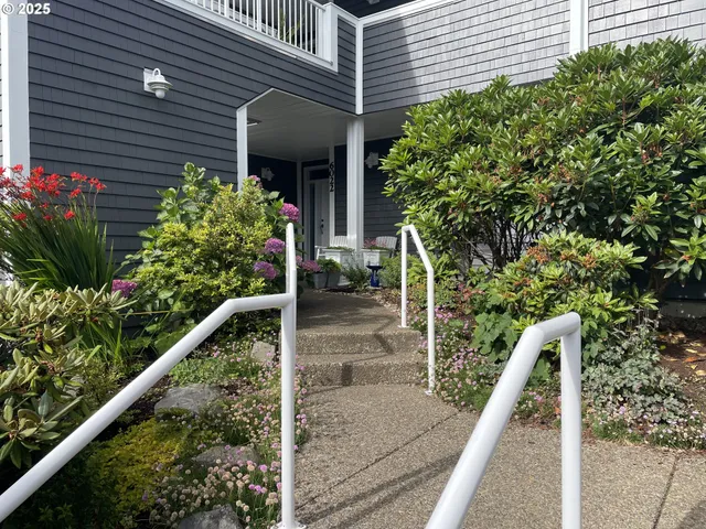 a house view with a potted plant