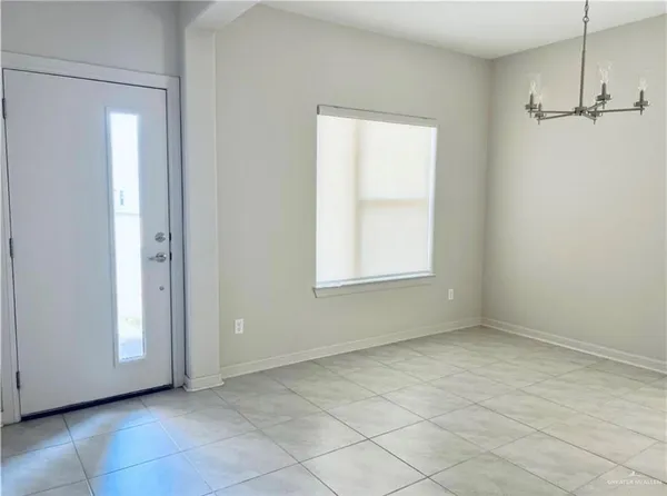 a kitchen with a stove and a microwave