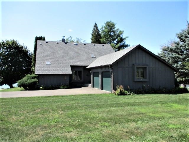 954 Winborne Road Lake Summerset, IL 61019 - Photo 1 of 26 a view of a house with yard and a garage