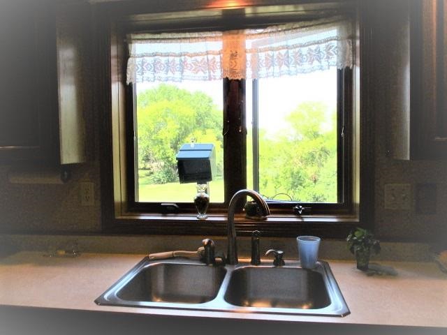 954 Winborne Road Lake Summerset, IL 61019 - Photo 12 of 26 a sink with a window