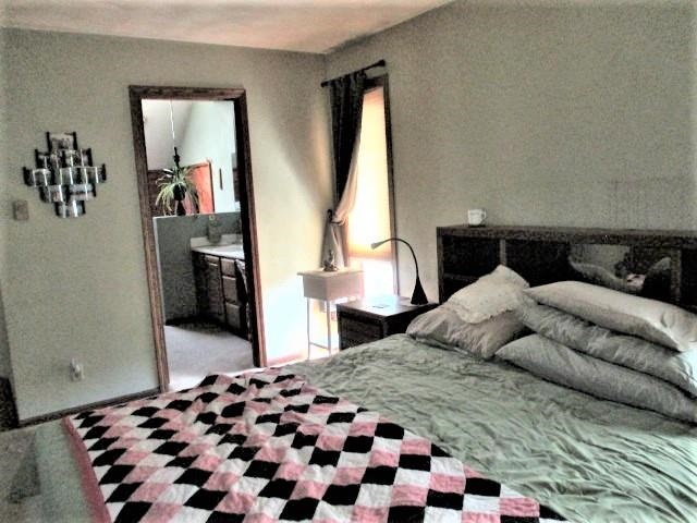 954 Winborne Road Lake Summerset, IL 61019 - Photo 16 of 26 a bedroom with a bed and a dresser