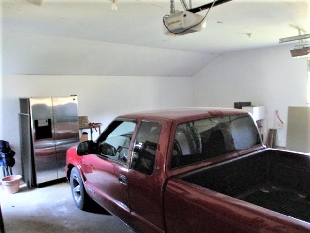 954 Winborne Road Lake Summerset, IL 61019 - Photo 22 of 26 a bedroom with a bed and tv