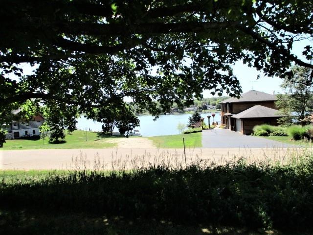 954 Winborne Road Lake Summerset, IL 61019 - Photo 24 of 26 a view of an outdoor space and a yard