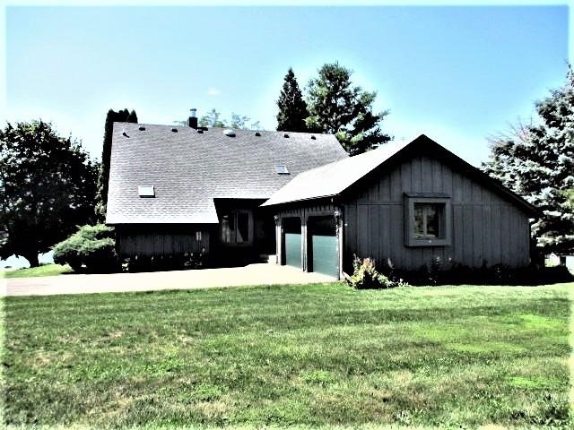 954 Winborne Road Lake Summerset, IL 61019 - Photo 25 of 26 a view of a house with a yard and trees