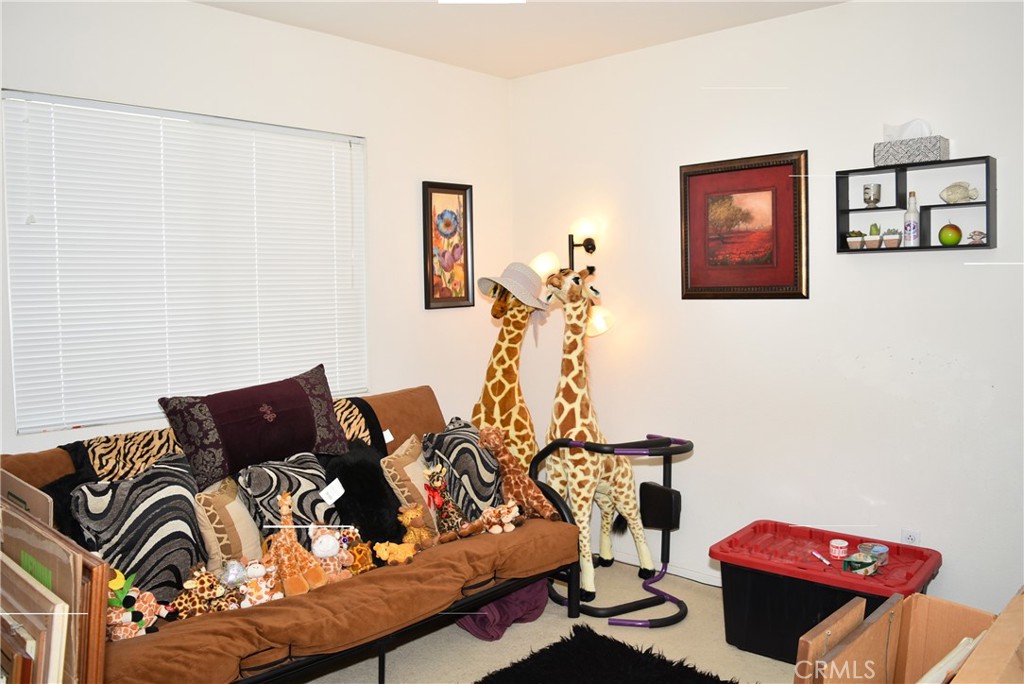 1665 Ravenswood Road Beaumont, CA 92223 - Photo 30 of 41 a living room with furniture
