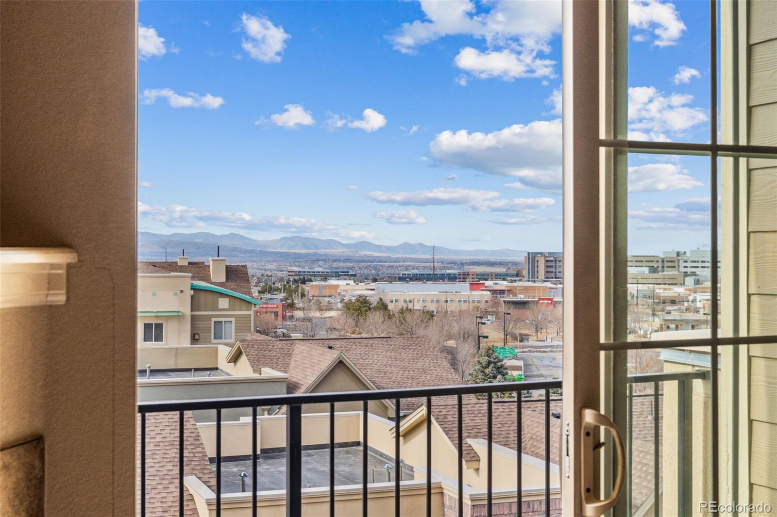 1062 Rockhurst Drive, Unit 401 Highlands Ranch, CO 80129 - Photo 5 of 41 a view of a balcony with city view