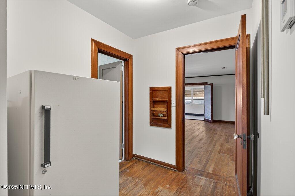1111 Inwood Terrace Jacksonville, FL 32207 - Photo 25 of 46 a view of a hallway with wooden floor