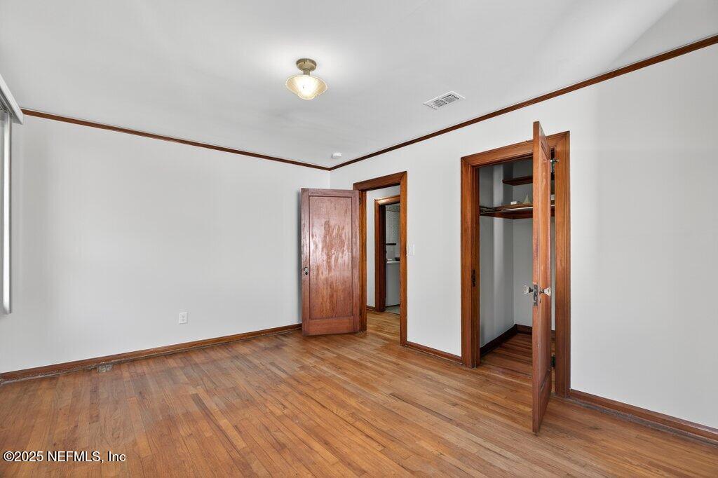 1111 Inwood Terrace Jacksonville, FL 32207 - Photo 33 of 46 a view of an empty room with wooden floor