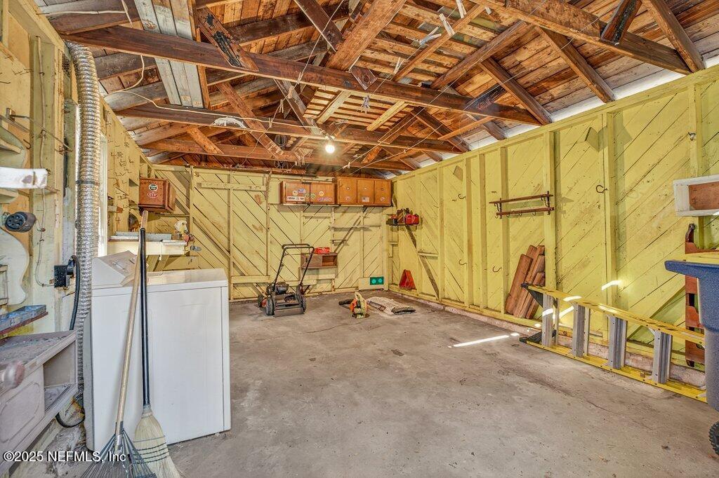 1111 Inwood Terrace Jacksonville, FL 32207 - Photo 43 of 46 a view of a garage with painted walls