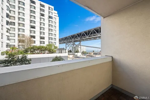 a view of a bathroom with a shower and a sink